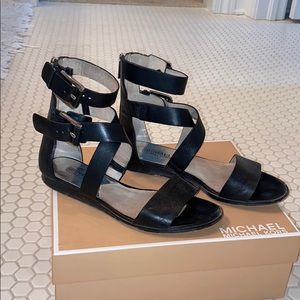 Michael kors black leather sandals.
